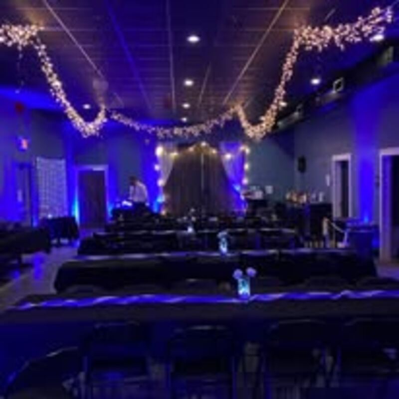 Airport Inn banquet room with blue uplighting