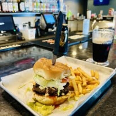Burger and fries at the bar